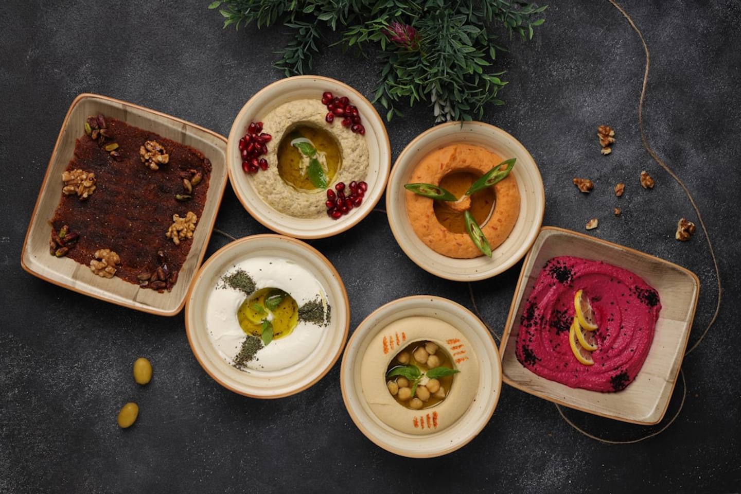 Colorful Middle Eastern sauces in bowls showing hidden carbs Middle Eastern sauces low-carb dieters should know about